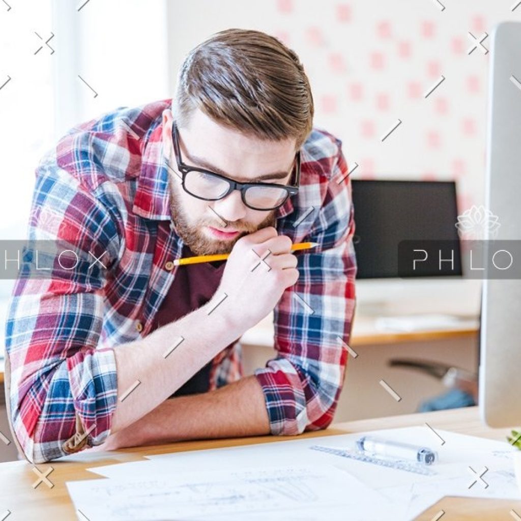 demo-attachment-98-thoughtful-creative-man-designing-project-and-PRNVMX2